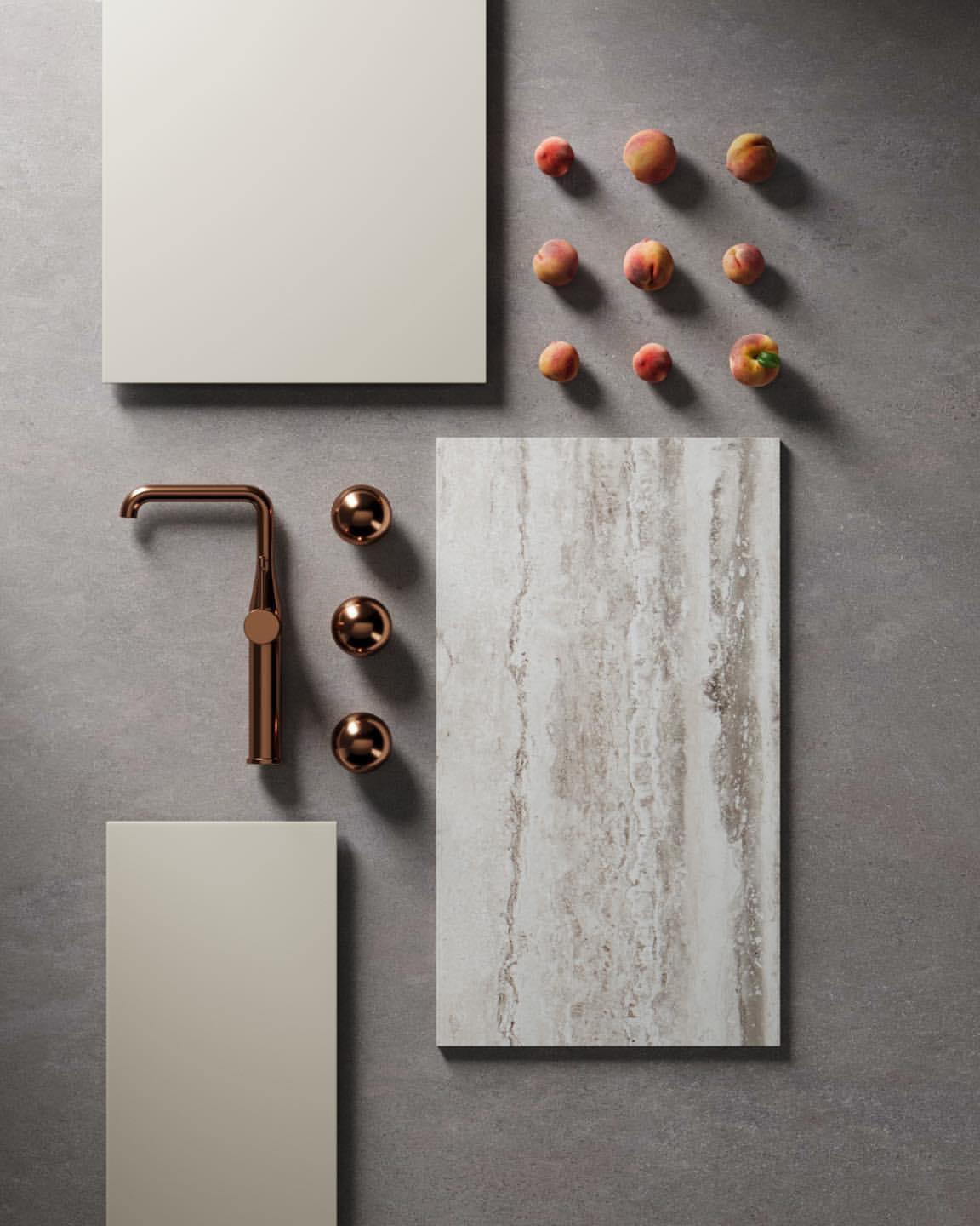 Materialmuster mit bronzefarbener Armatur und Steinplatte